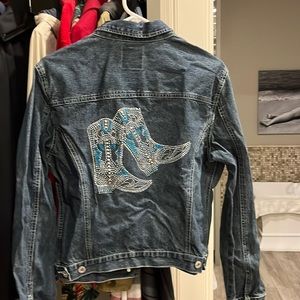 Turquoise boots on a cute blue Jean jacket.